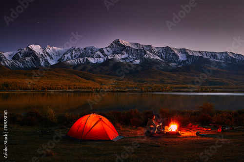 Great view of rock and lake. Dramatic and picturesque scene.