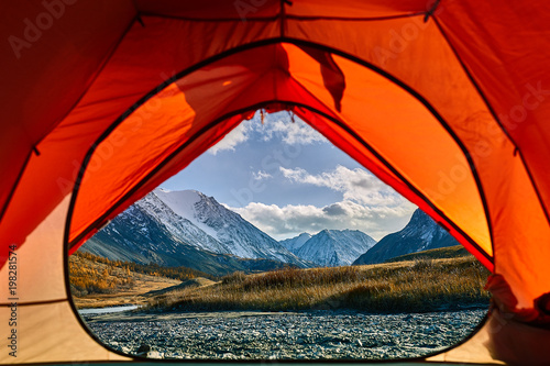 Great view of rock and lake. Dramatic and picturesque scene.