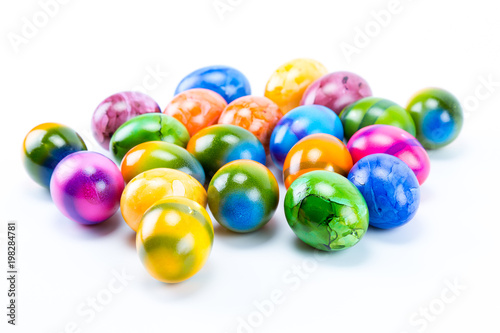 Colorful chicken hand painted easter eggs with white background