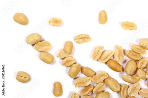 Fried and salted peanuts pile isolated on white background, top view 