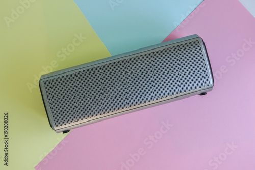 Fototapeta portable bluetooth wireless speaker on pastel background