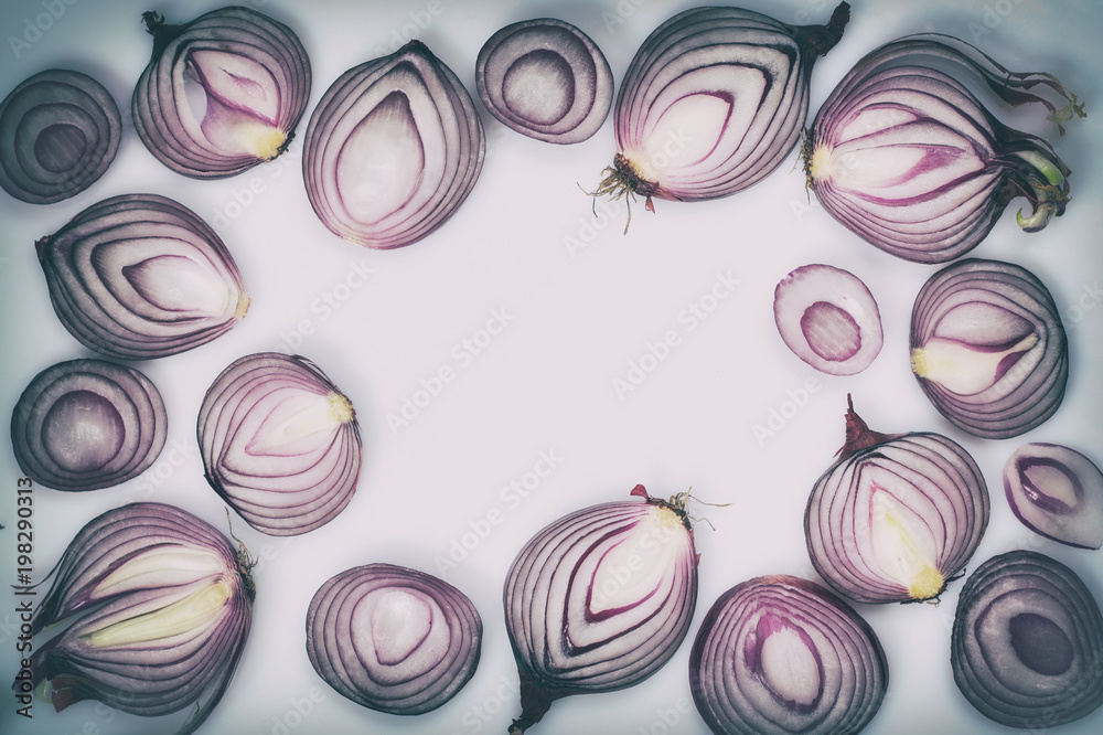 Sliced red onion on a white background