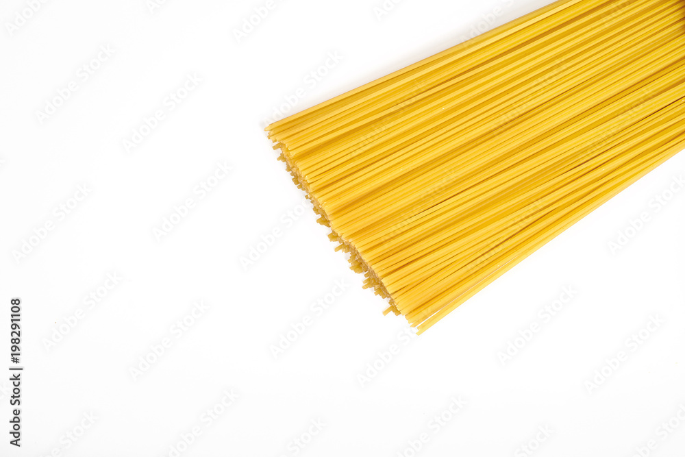 Uncooked pasta spaghetti macaroni isolated on white background Uncooked pasta spaghetti macaroni isolated on white background
