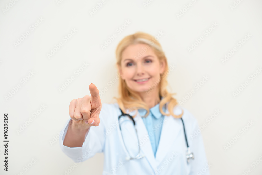 close-up shot of doctor making touch gesture with finger, transparent visual interface concept close-up shot of doctor making touch gesture with finger, transparent visual interface concept