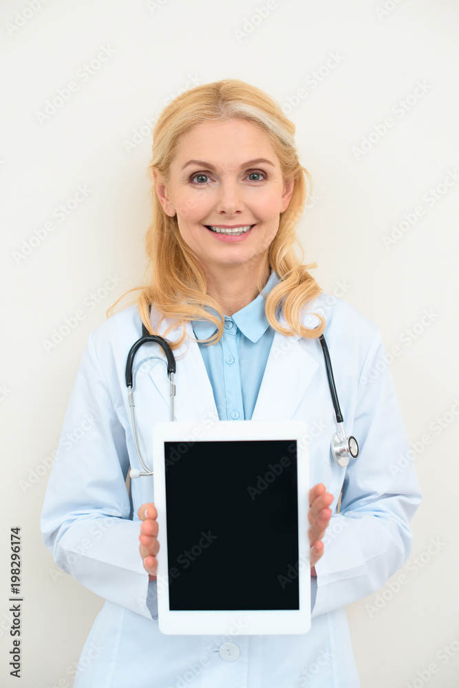 happy female doctor with digital tablet on white happy female doctor with digital tablet on white