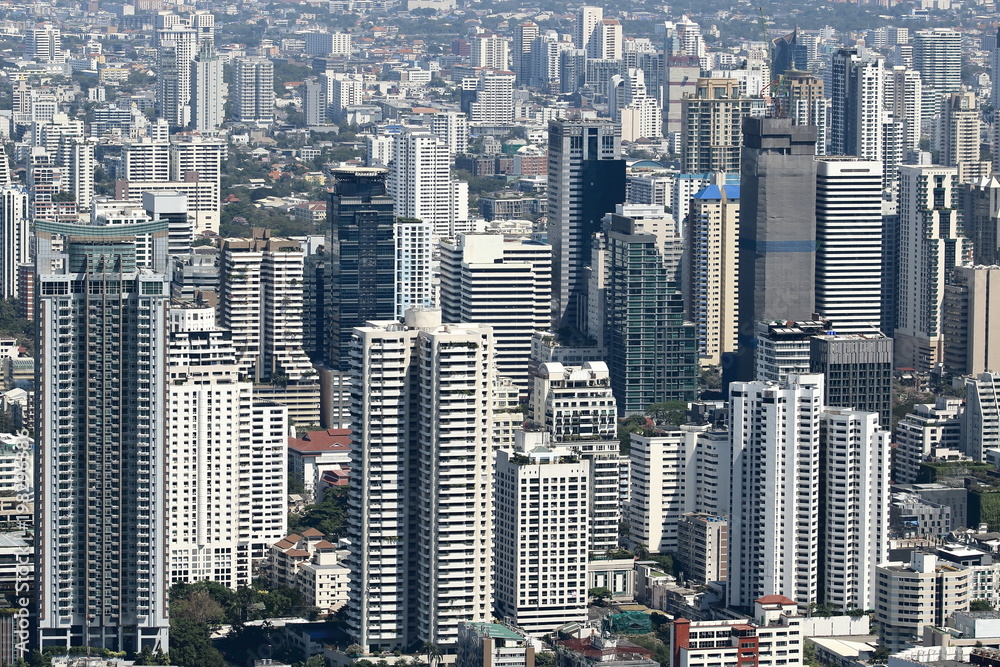 Fototapeta Aerial view of contemporary modern building in Bangkok cityscape