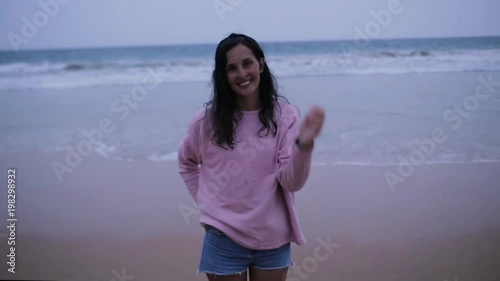 girl on the ocean in cloudy weather. photo