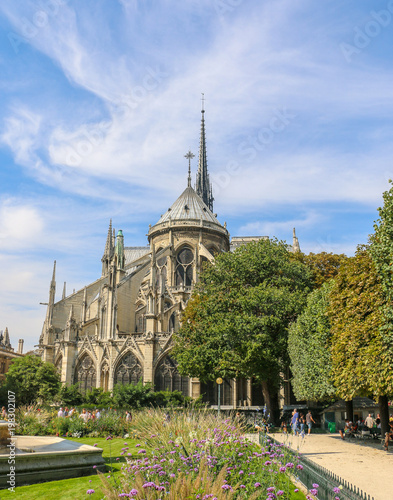 Notre Dame Cathedral with Flower Garden in Paris,France