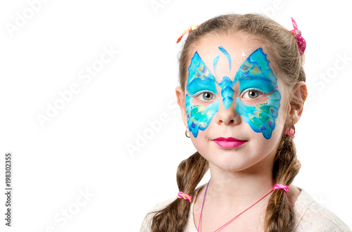 Girl with fashionable butterfly face art