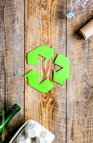 environment concept with recycling symbol on rustic background t