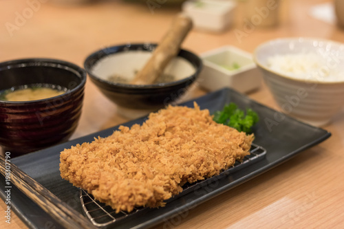 Top view Close up of Tonkatsu is a Japanese dish which consists of a breaded, deep fried pork cutlet