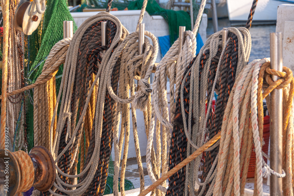 Closeup of coiled ropes on a commercial fishing boat Closeup of coiled ropes on a commercial fishing boat