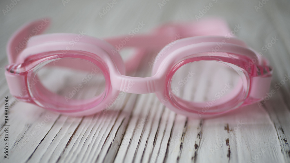 pink goggles on the table pink goggles on the table