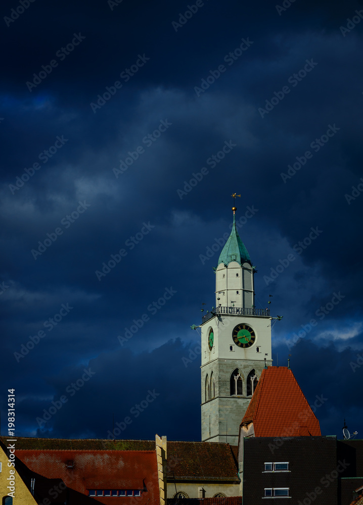 Dark clouds arise over a catholic church