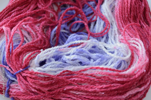 macro of multicolored wool yarn in skein