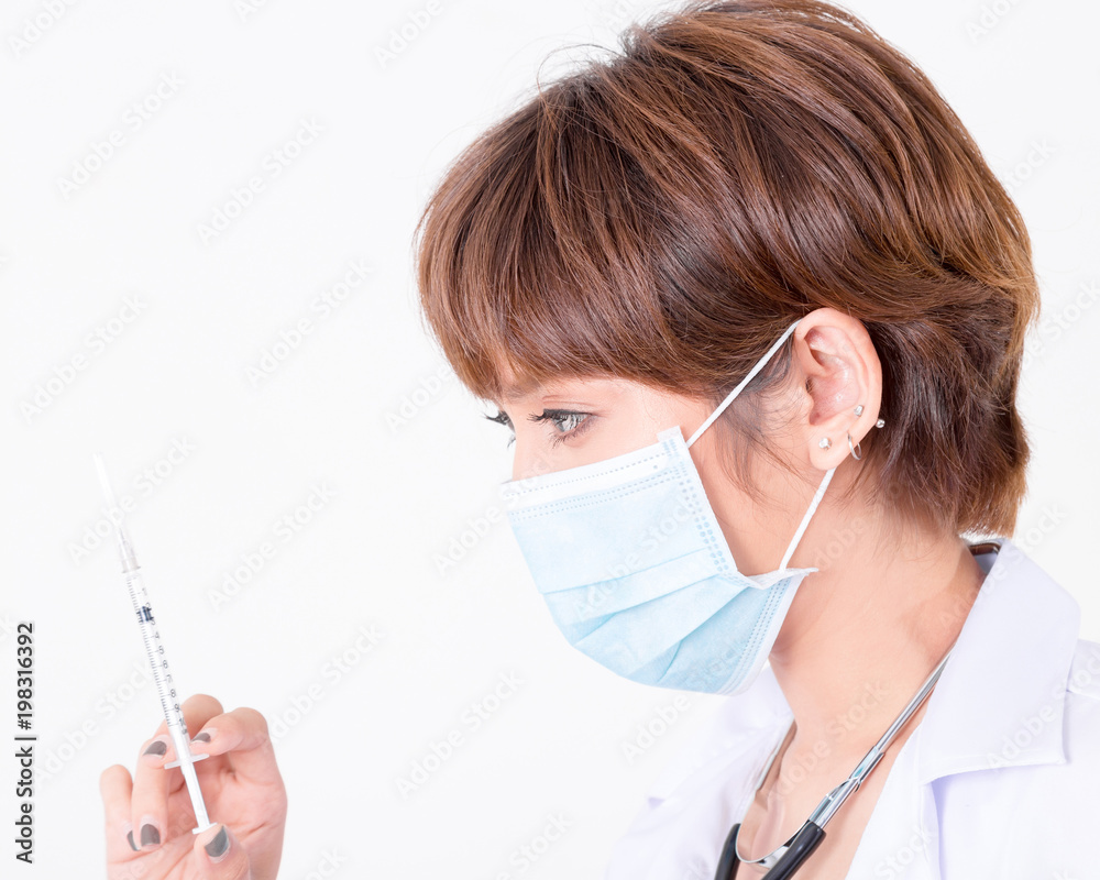 Doctor with syringe in hand. medical health professional holding a vaccine injection with fingers. Isolated on white background. Studio lighting. Concept for healthy Doctor with syringe in hand. medical health professional holding a vaccine injection with fingers. Isolated on white background. Studio lighting. Concept for healthy