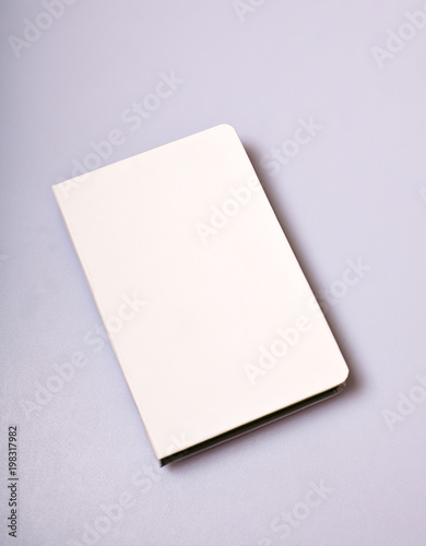 Notepad blank cover on white table