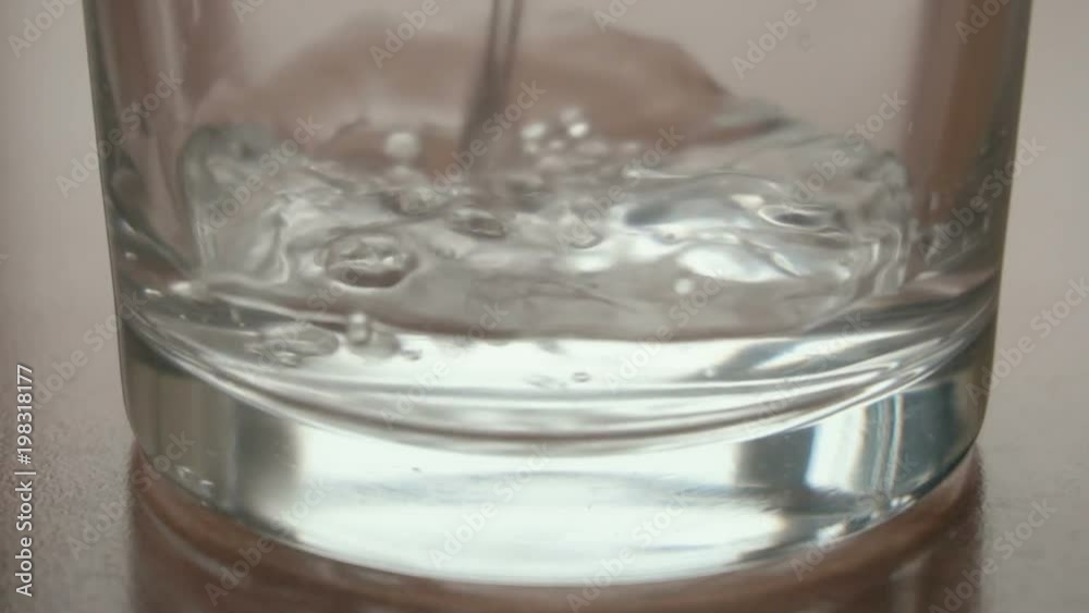 Pouring glass of water in slow motion. fullHD video shot Pouring glass of water in slow motion. fullHD video shot