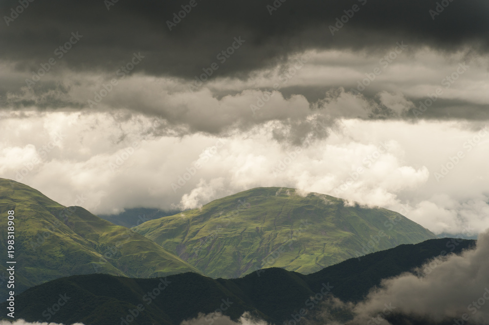 bad weather over the green hills of the Cerros de Pereyra