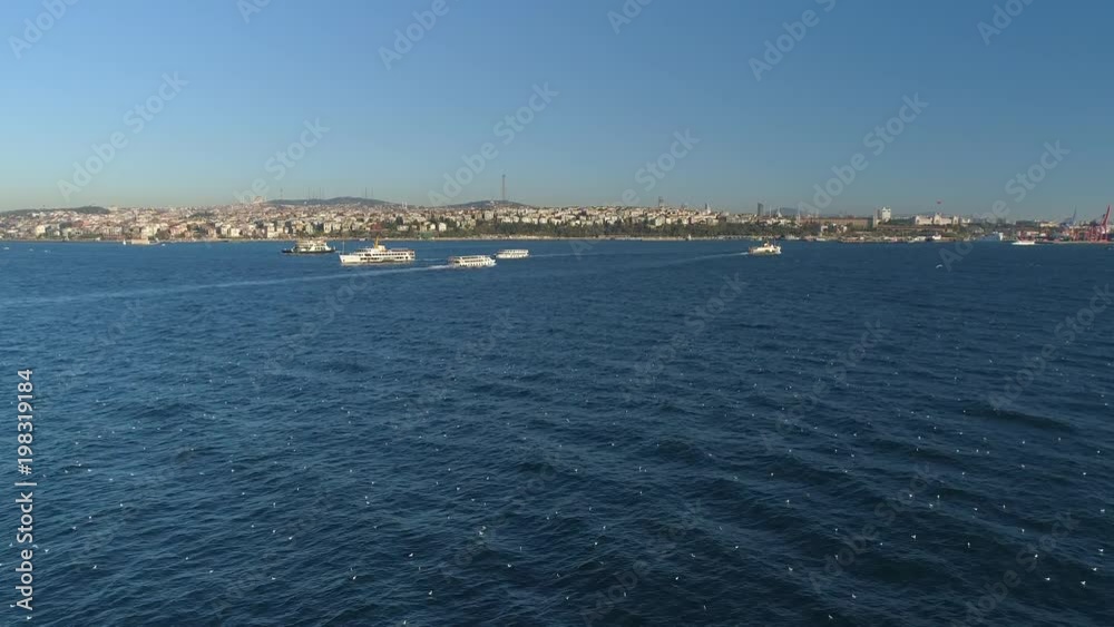 Ships floating Bosphorus blue water sunny day. Aerial drone view on sunset in Istanbul, Turkey Ships floating Bosphorus blue water sunny day. Aerial drone view on sunset in Istanbul, Turkey