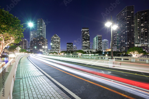 Streaking lights on Brickell key Drive with Brickell district skyline, Miami, Florida, USA © Jose Luis Stephens