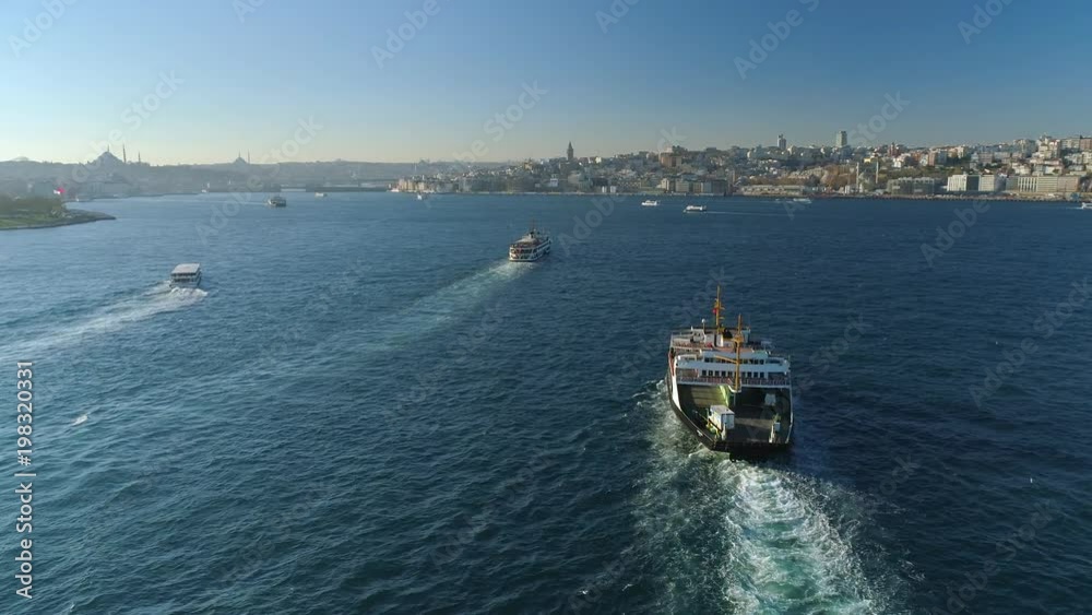 Ships floating Bosphorus blue water sunny day. Aerial drone view on sunset in Istanbul, Turkey Ships floating Bosphorus blue water sunny day. Aerial drone view on sunset in Istanbul, Turkey