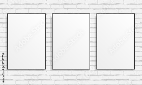 Three blank posters on white brick wall. Vector template