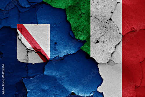flags of Campania and Italy painted on cracked wall