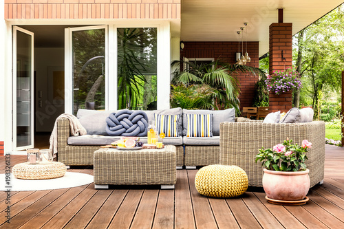 Beige garden furniture on terrace photo