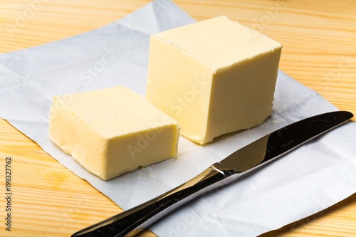 Butter and knife on desk