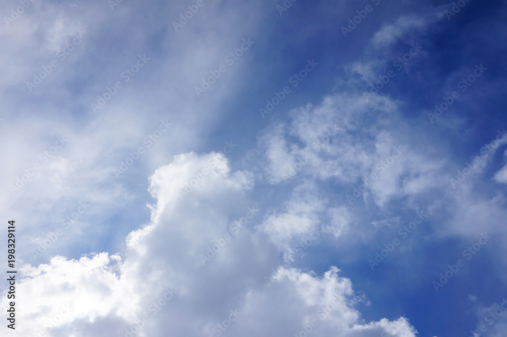 texture of a bright blue sky with a large cloud texture of a bright blue sky with a large cloud