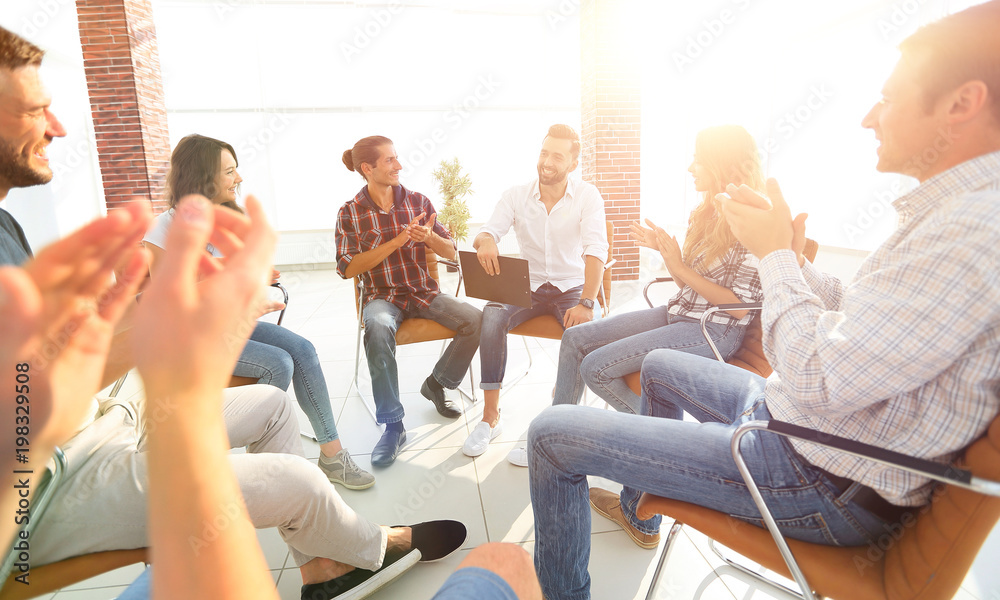 © ASDF - creative team applauding the speaker
