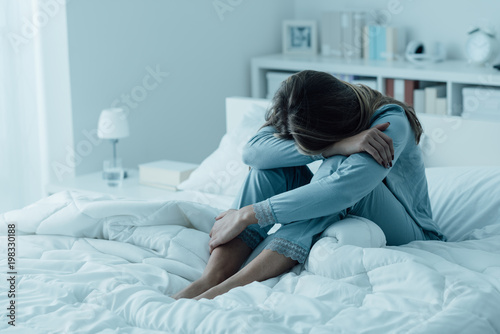 Depressed woman awake in the night