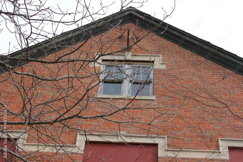 Exterior of old brick abandoned historical mental asylum facility Exterior of old brick abandoned historical mental asylum facility
