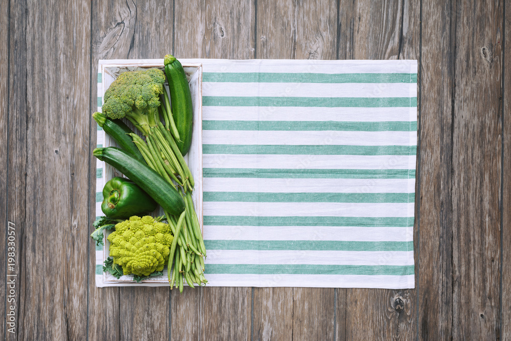 Fototapeta premium Fresh vegetables on the kitchen worktop