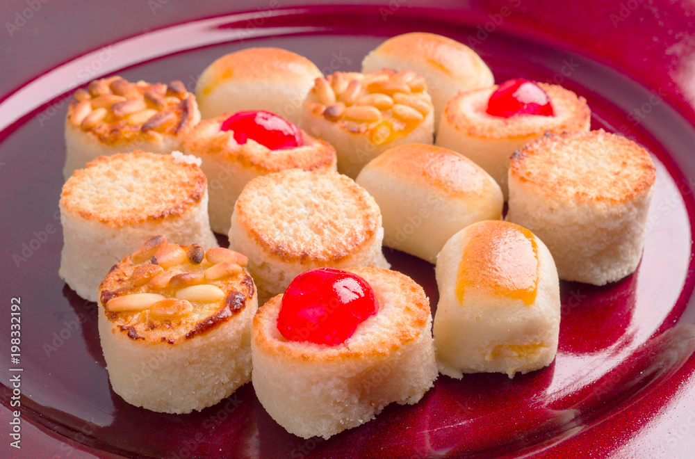 group of marzipan in red tray isolated on white group of marzipan in red tray isolated on white