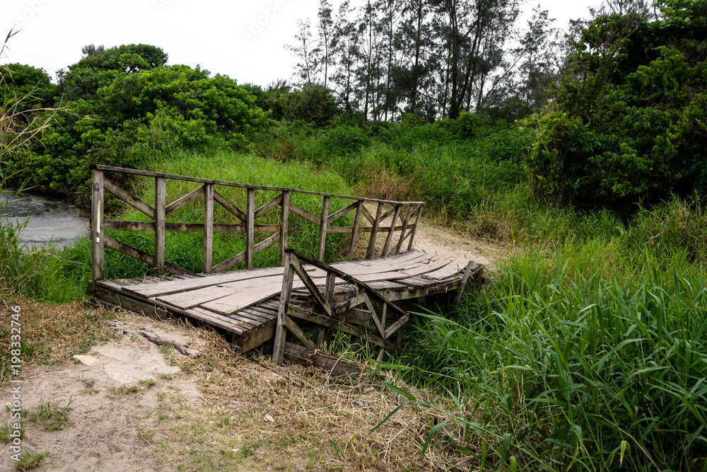 Old bridge over a small river