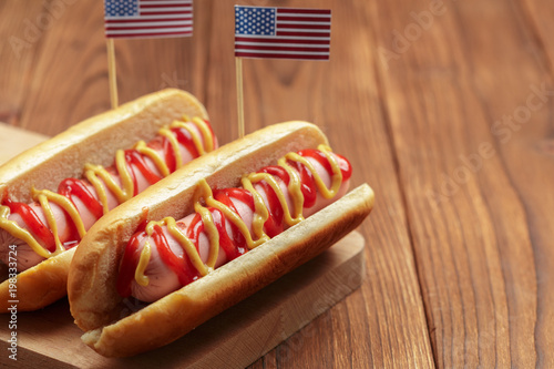 Hot dogs on wooden background
