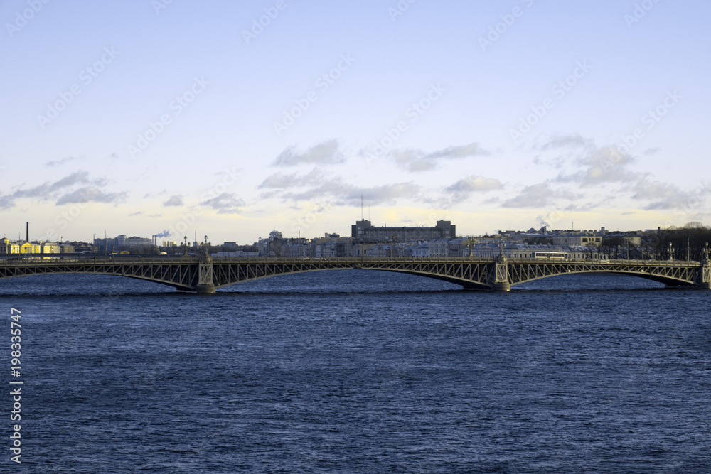 View of the beautiful city of St. Petersburg, the Neva River, the bridge and the beautiful sky.