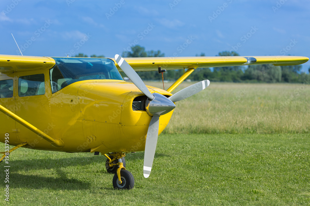 Small and Light Yellow Piper Aircraft near to the Runaway Ready to Take Off Small and Light Yellow Piper Aircraft near to the Runaway Ready to Take Off