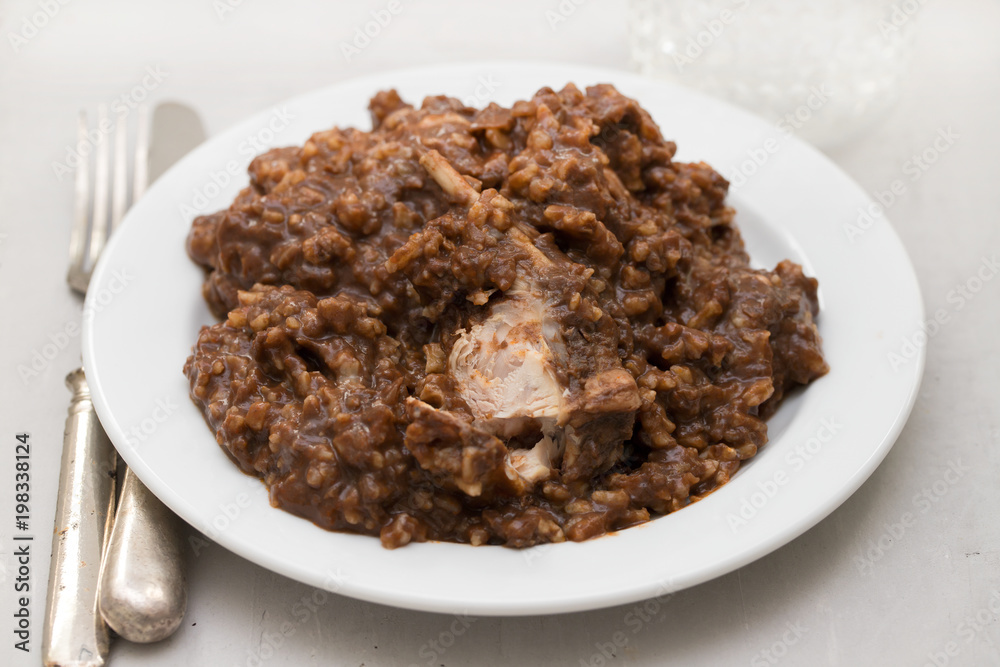 rice with rabbit on dish on wooden background rice with rabbit on dish on wooden background