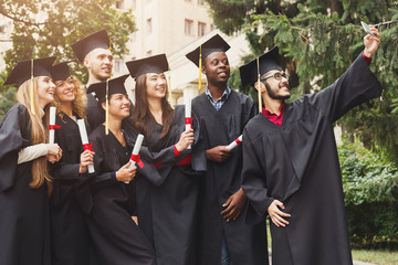 A group of graduates celebrating