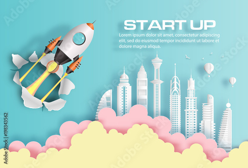 Paper art style of rocket breaking through paper over modern city, start up business concept, flat-style vector illustration.