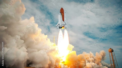 Space Shuttle launching in slow motion. Elements of this video furnished by NASA. photo