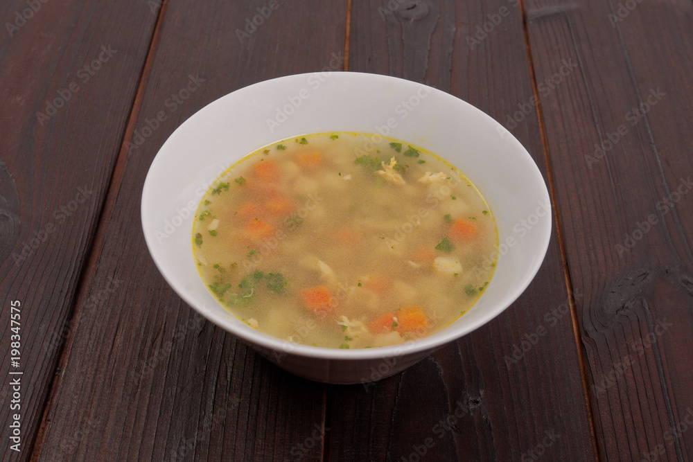 Tasty bread soup with vegetables on a table Tasty bread soup with vegetables on a table