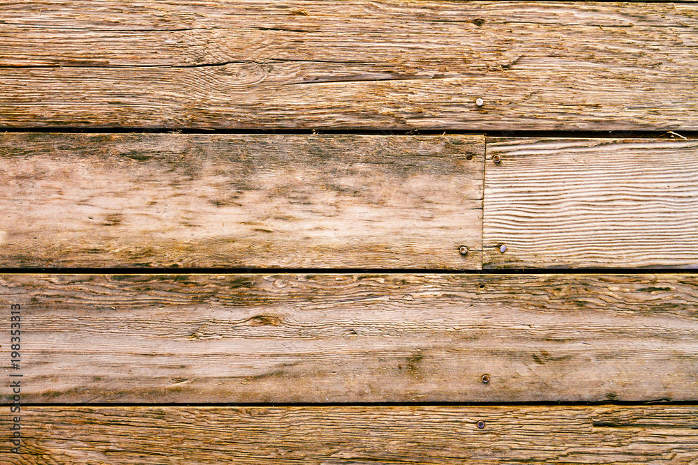 Close-up of floor with nailed wooden boards Close-up of floor with nailed wooden boards
