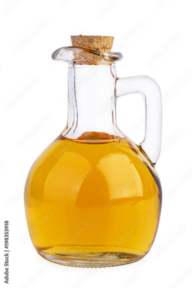 Decanter with apple vinegar isolated on the white background