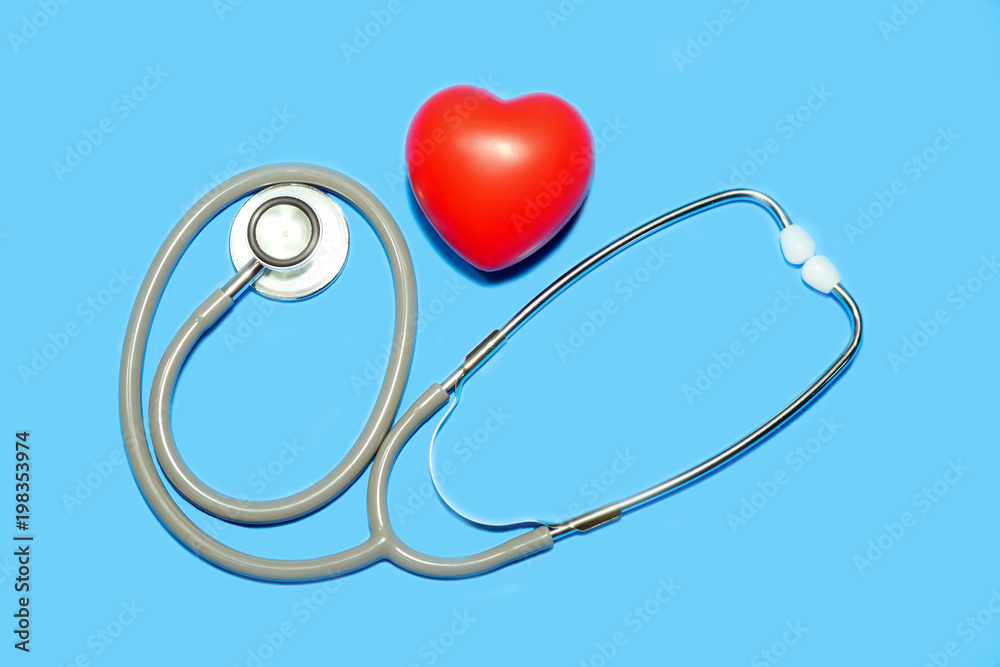 Stethoscope with heart on blue background. Heath care concept. Stethoscope with heart on blue background. Heath care concept.