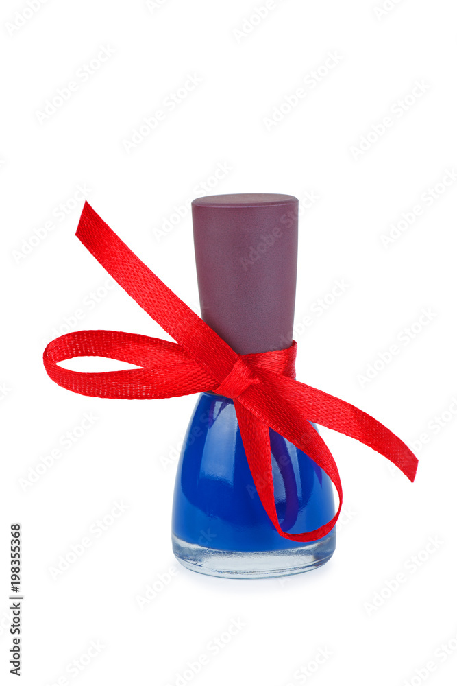 Obraz premium Bottle with blue nail polish tied with red bow