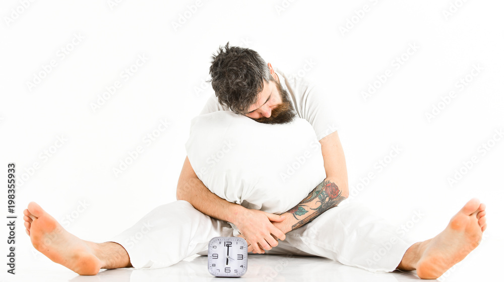 Man with tattoo fall asleep while sitting, white background. Man with tattoo fall asleep while sitting, white background.